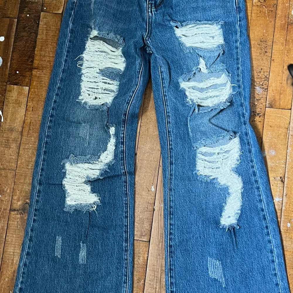 Women’s Distressed Blue Jeans